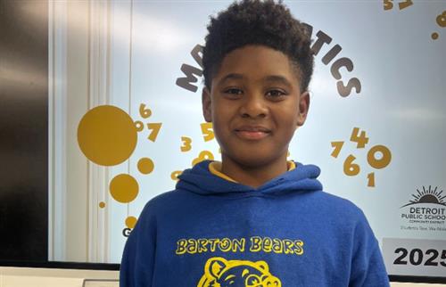 Boy posing for math bee competition